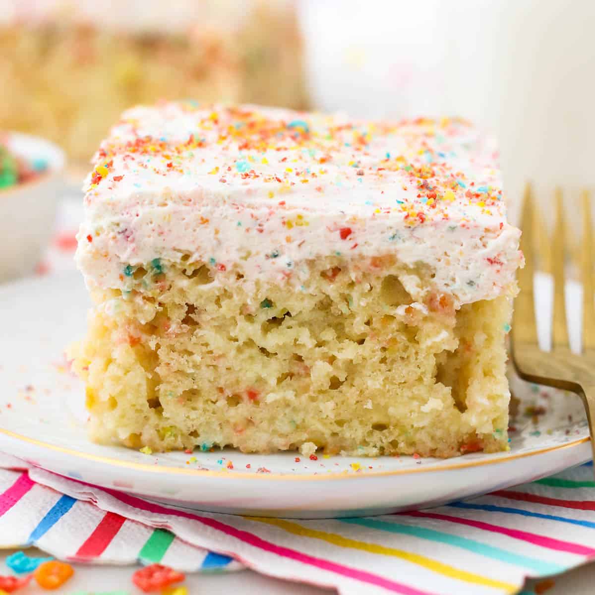 Fruity Pebble Poke Cake