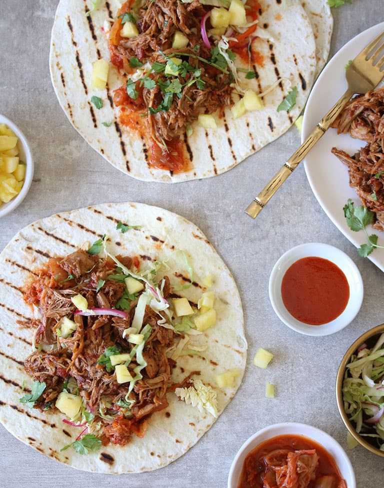 Asian Inspired Pulled Pork Tacos with Fresh Pineapple & Kimchi