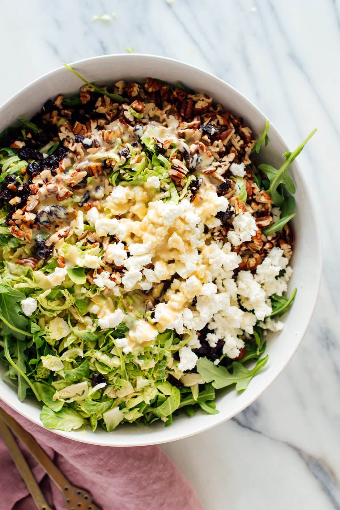 Shredded Brussels Sprouts & Arugula Salad with Sunshine Dressing