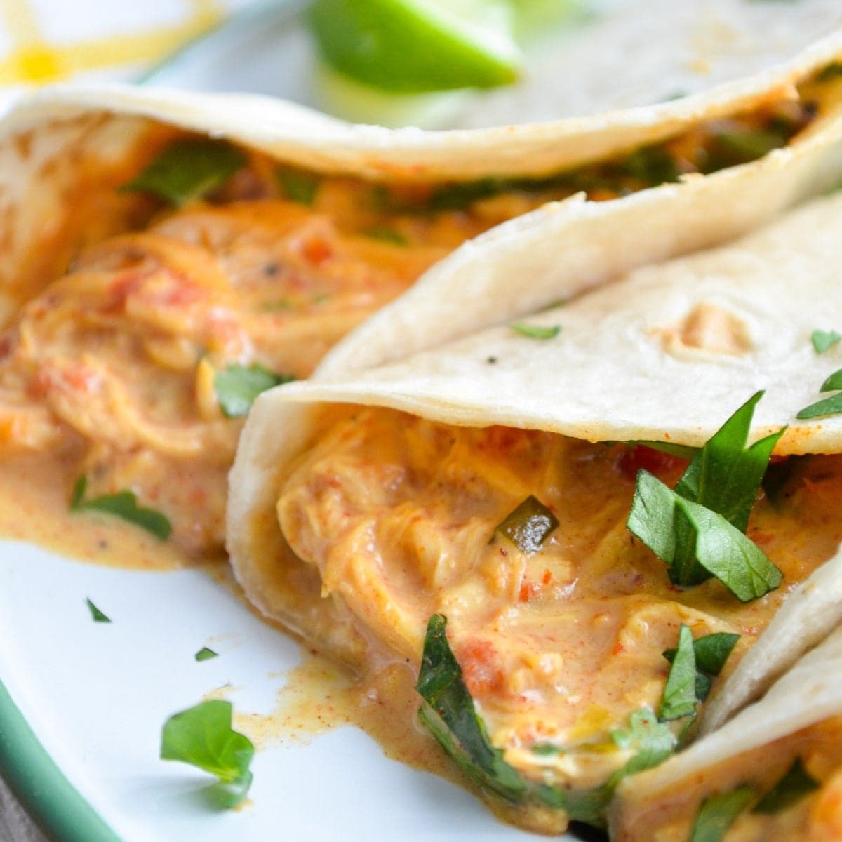 Slow Cooker Queso Chicken Tacos