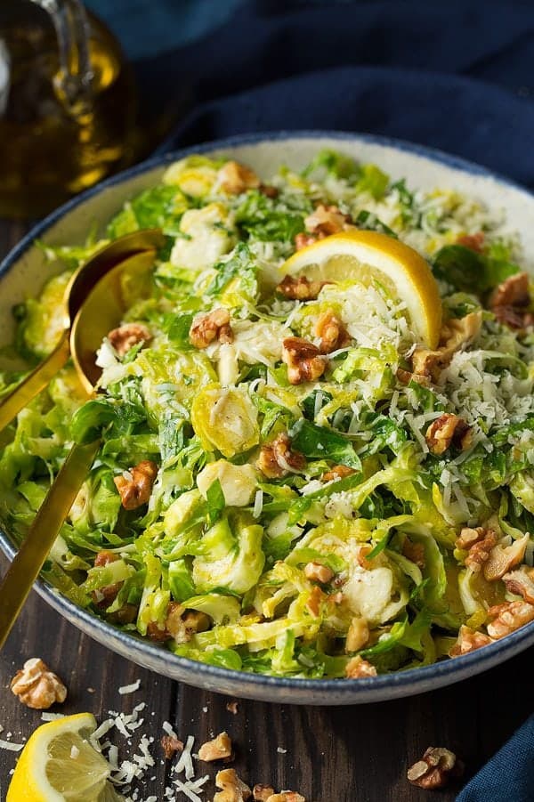 Shredded Brussels Sprout Salad with Romano Cheese Toasted Walnuts and Lemon Vinaigrette
